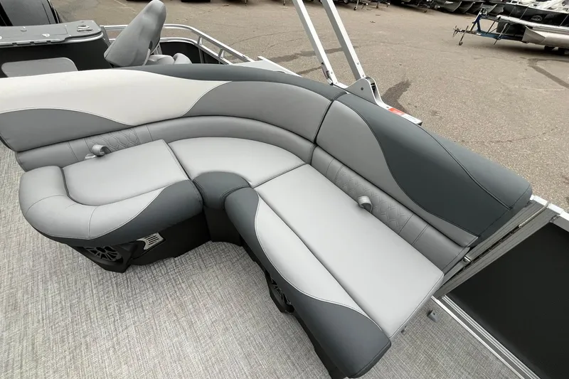Slide: The Image of Luxurious seating on 2025 Avalon LSZ Rear Fish pontoon boat, featuring sleek gray upholstery. - 12