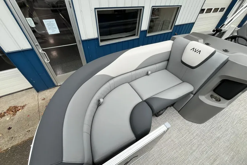 Slide: The Image of 2025 Avalon LSZ Rear Fish boat with stylish gray seating and modern design. - 9