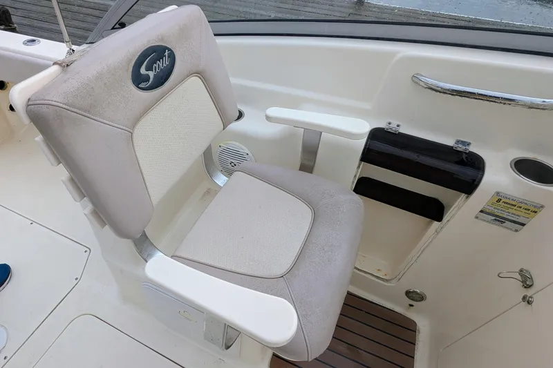 Slide: The Image of 2009 Scout 245 Dorado boat seat with armrests and logo. - 9