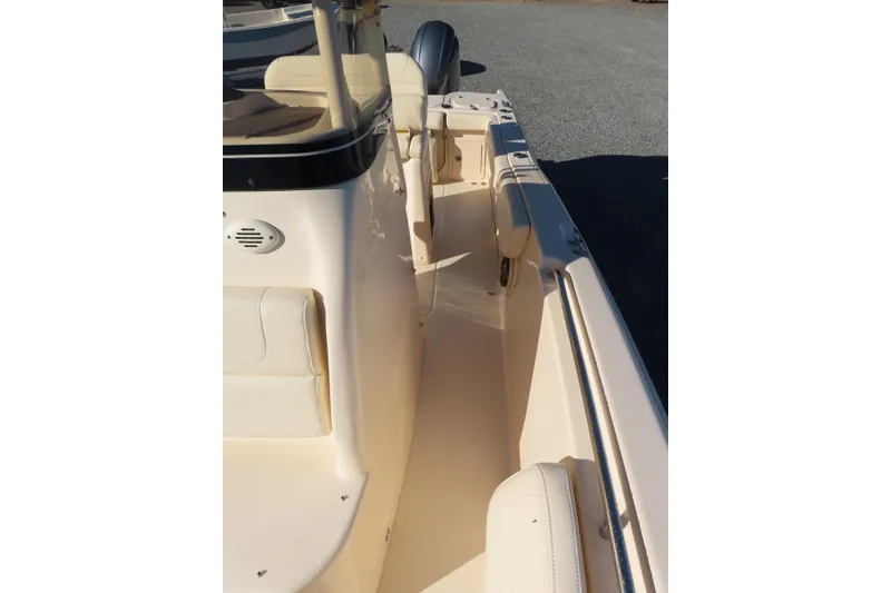 Slide: The Image of 2019 Grady-White Fisherman 257 boat interior, featuring seating and console details. - 13
