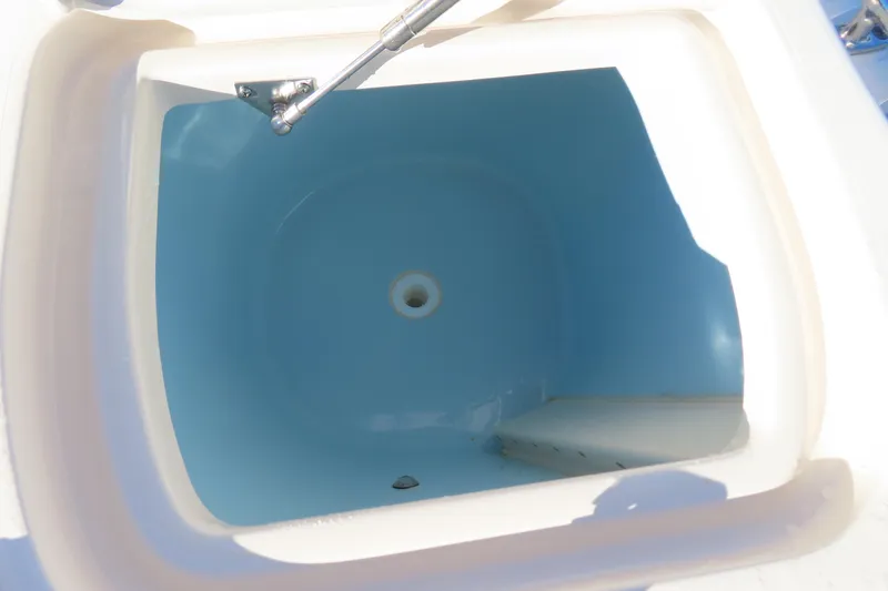 Slide: The Image of Livewell compartment on 2019 Grady-White Fisherman 257 boat, open and empty. - 25