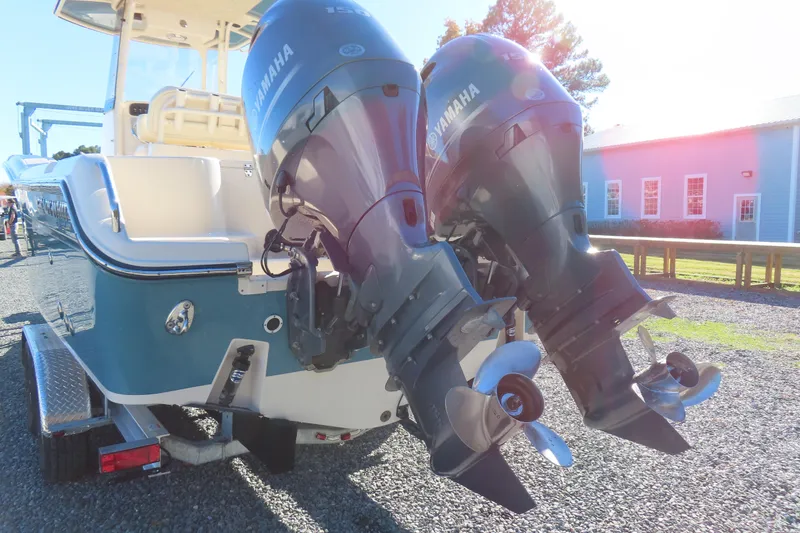Slide: The Image of 2019 Grady-White Fisherman 257 with dual Yamaha outboard motors on a trailer. - 5
