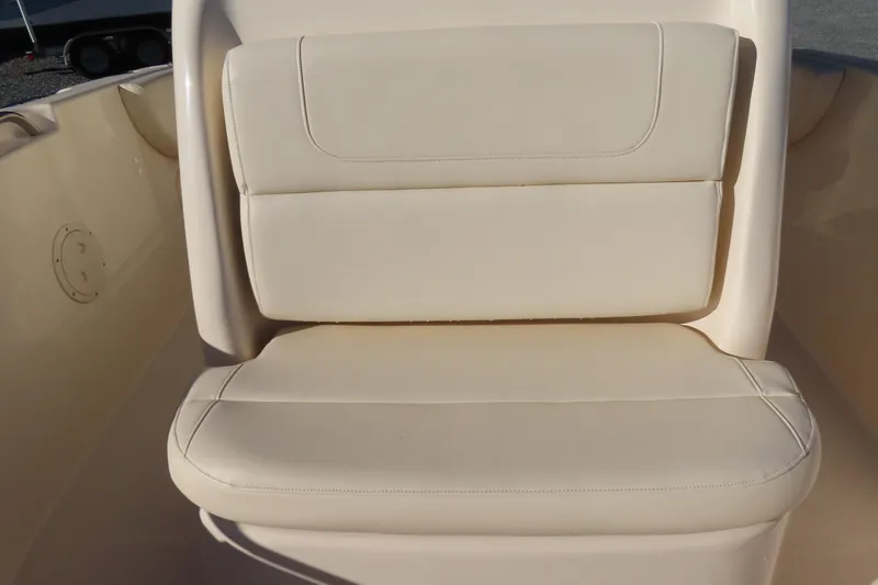 Slide: The Image of 2019 Grady-White Fisherman 257 boat seat, beige upholstery, close-up view. - 6
