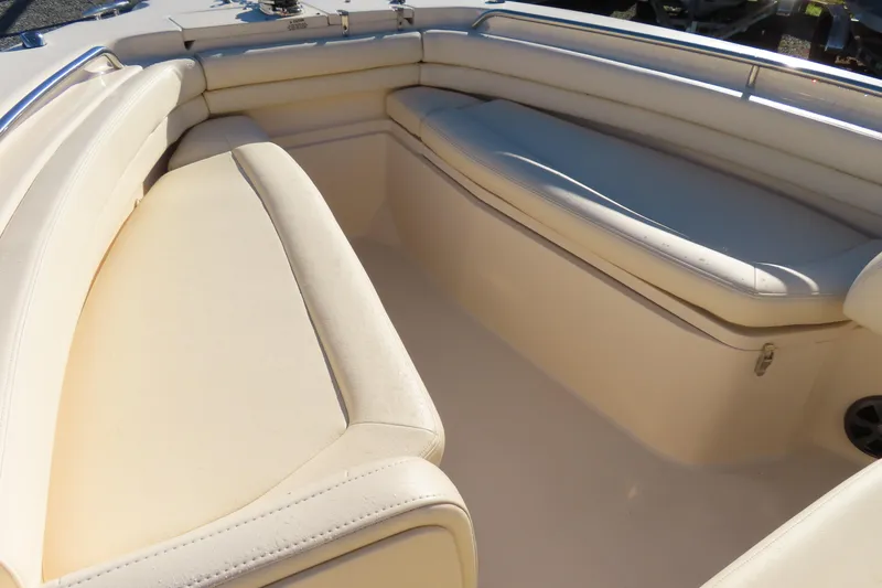 Slide: The Image of 2019 Grady-White Fisherman 257 boat interior with cushioned seating. - 7