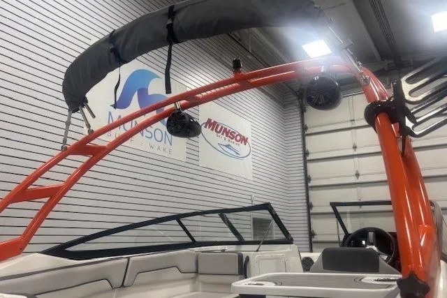 Slide: The Image of 2019 Yamaha Boats AR190 with orange wakeboard tower in showroom. - 14