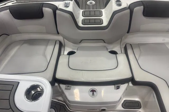 Slide: The Image of 2019 Yamaha Boats AR190 interior seating area with sleek, modern design and comfortable upholstery. - 46