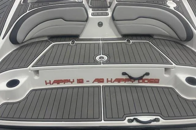 Slide: The Image of 2019 Yamaha Boats AR190 deck with cushioned seating and custom lettering. - 47