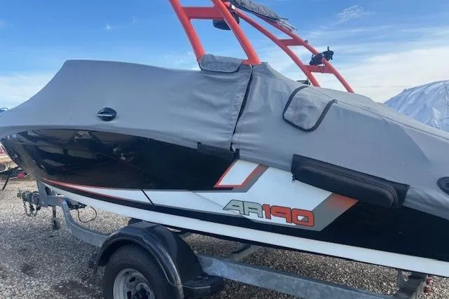 Slide: The Image of 2019 Yamaha Boats AR190 covered on trailer, ready for transport. - 6