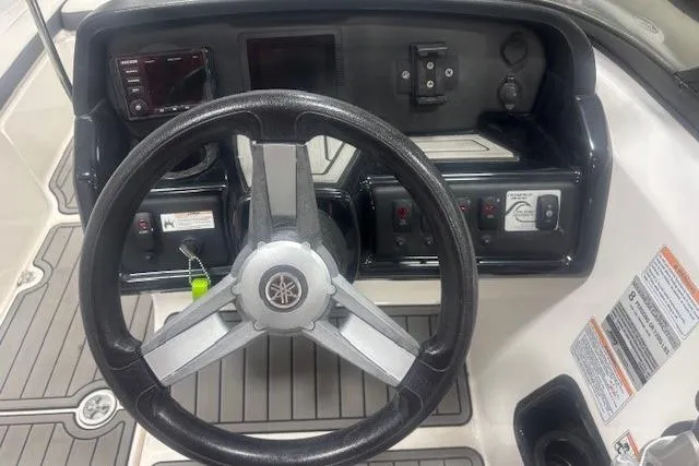 Slide: The Image of 2019 Yamaha Boats AR190 dashboard with steering wheel and control panel. - 7