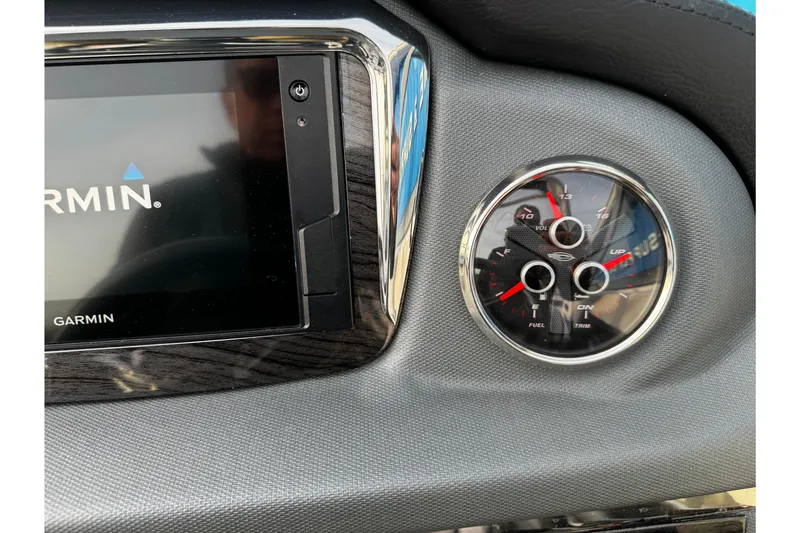 Slide: The Image of Dashboard of 2019 Chaparral 246 SSi with Garmin display and gauges. - 14