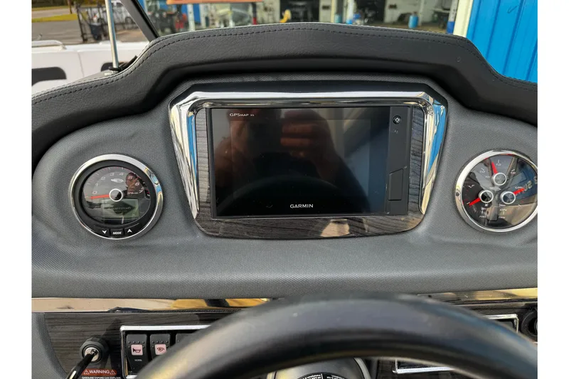Slide: The Image of Dashboard of 2019 Chaparral 246 SSi boat with Garmin GPS and gauges. - 15