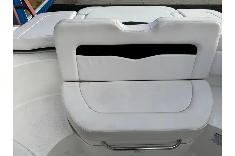 Slide: The Image of White seating on 2019 Chaparral 246 SSi boat, featuring sleek design and comfortable upholstery. - 29