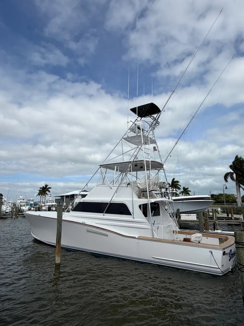 Slide: The Image of 1985 Monterey Convertible Yacht on open sea. - 1