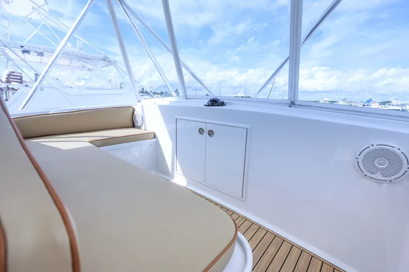 Slide: The Image of Interior of a 1985 Monterey Convertible boat with seating area. - 15