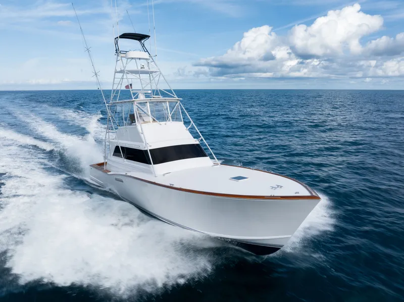 Slide: The Image of 1985 Monterey Convertible Yacht on open sea. - 7