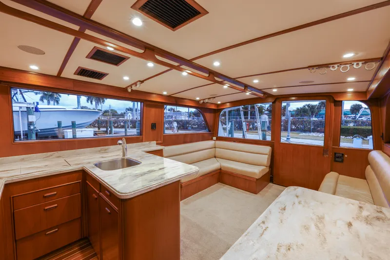 Slide: The Image of Interior of a 1985 Monterey Convertible boat with luxurious furnishings. - 9