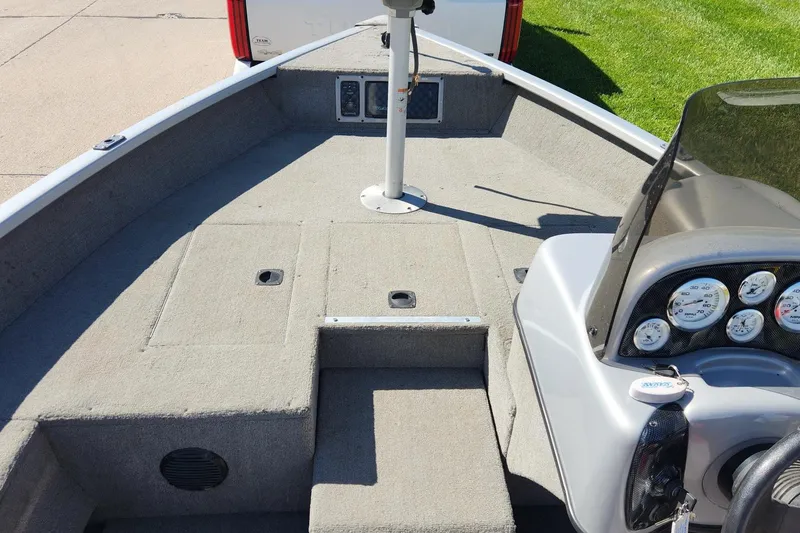 Slide: The Image of 2005 Tracker Targa 17 boat interior with dashboard and seating area. - 6