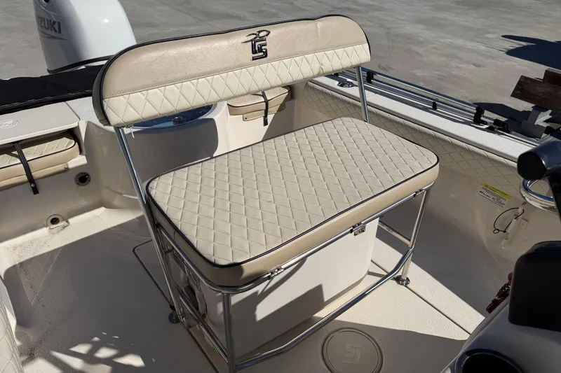 Slide: The Image of 2022 Sea Chaser 21 Sea Skiff boat interior with beige cushioned seating. - 20