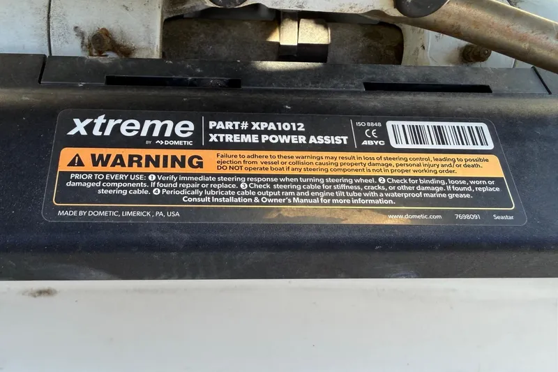Slide: The Image of Warning label on Dometic Xtreme Power Assist for 2022 Sea Chaser 21 Sea Skiff. - 26