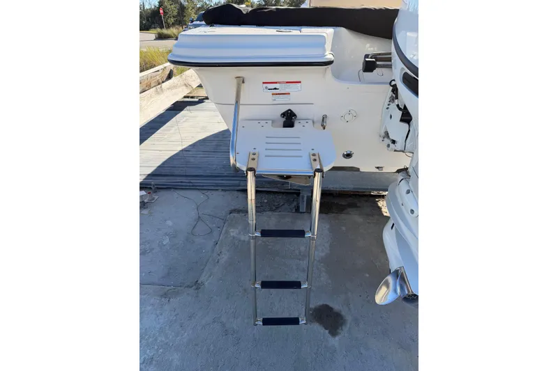 Slide: The Image of 2022 Sea Chaser 21 Sea Skiff with foldable swim ladder. - 31