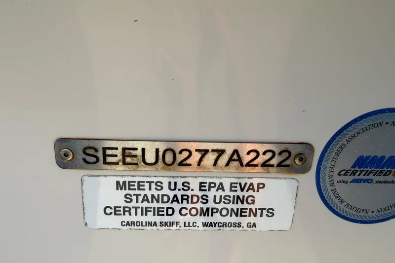 Slide: The Image of 2022 Sea Chaser 21 Sea Skiff certification labels and serial number plate. - 35