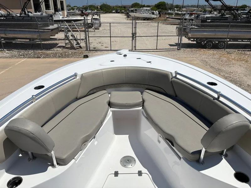 Slide: The Image of 2021 Sportsman Heritage 241 Center Console boat with spacious seating area. - 25