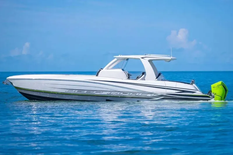 The Image of 2026 Deep Impact 399 Sport boat on calm blue ocean waters. - 1