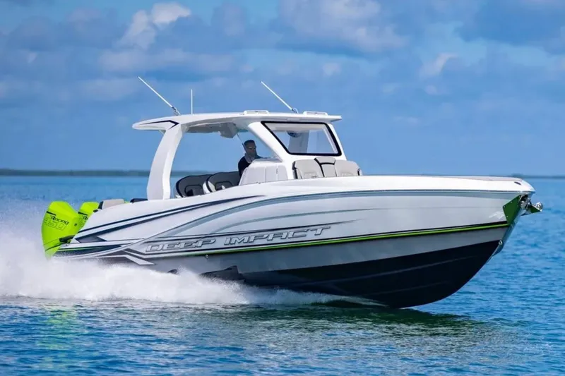 Slide: The Image of 2026 Deep Impact 399 Sport boat cruising on open water, showcasing sleek design and powerful engines. - 16