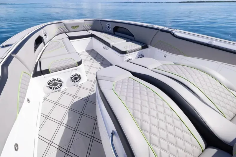 Slide: The Image of Luxurious interior of 2026 Deep Impact 399 Sport boat with quilted seating and ocean view. - 33