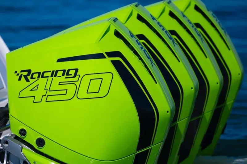 Slide: The Image of Bright green Racing 450 outboard engines on a 2026 Deep Impact 399 Sport boat. - 4
