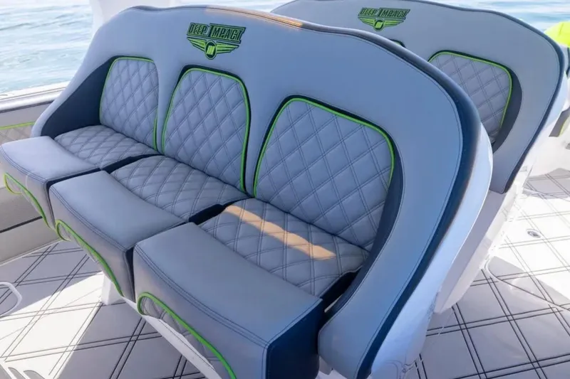 Slide: The Image of Luxury seating on 2026 Deep Impact 399 Sport boat with quilted design. - 50
