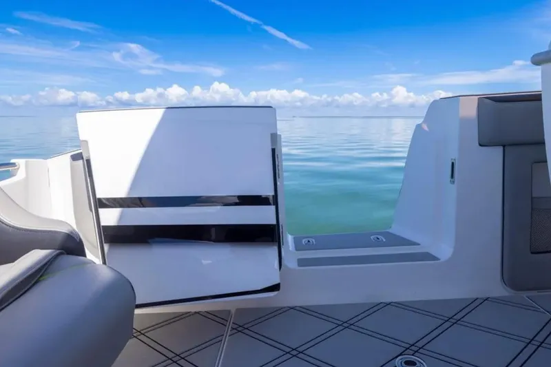 Slide: The Image of 2026 Deep Impact 399 Sport boat interior with ocean view and clear blue sky. - 62