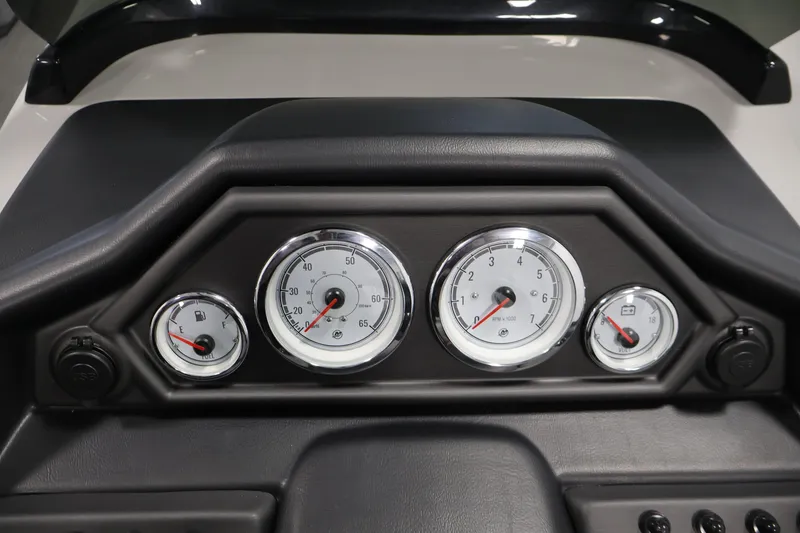Slide: The Image of Dashboard of 2026 Bentley Pontoons 220 Navigator with gauges and controls. - 17