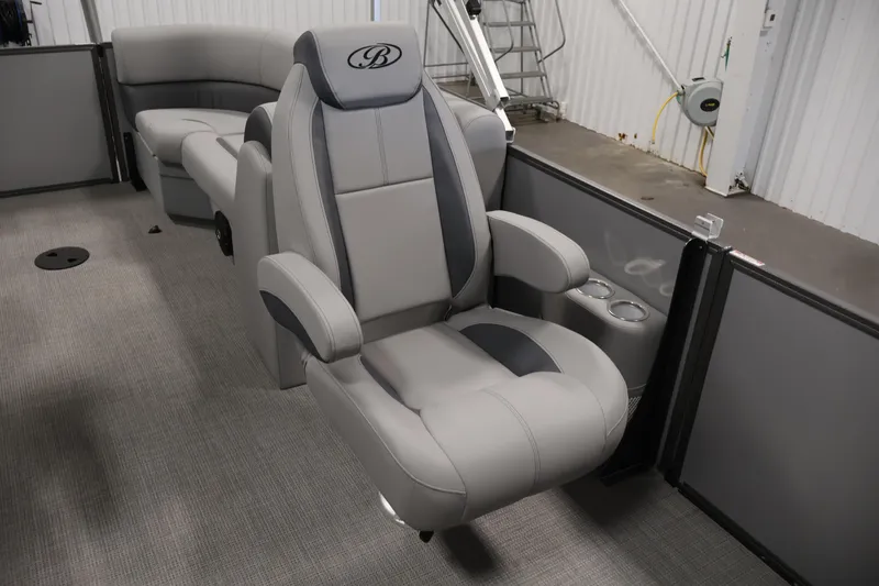 Slide: The Image of 2026 Bentley Pontoons 220 Navigator interior with luxurious seating and cup holders. - 23