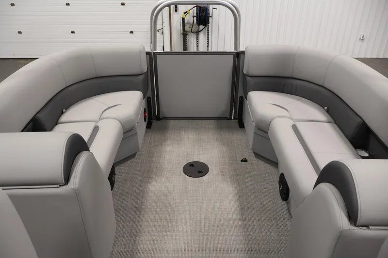 Slide: The Image of 2026 Bentley Pontoons 220 Navigator interior with gray seating and spacious layout. - 24