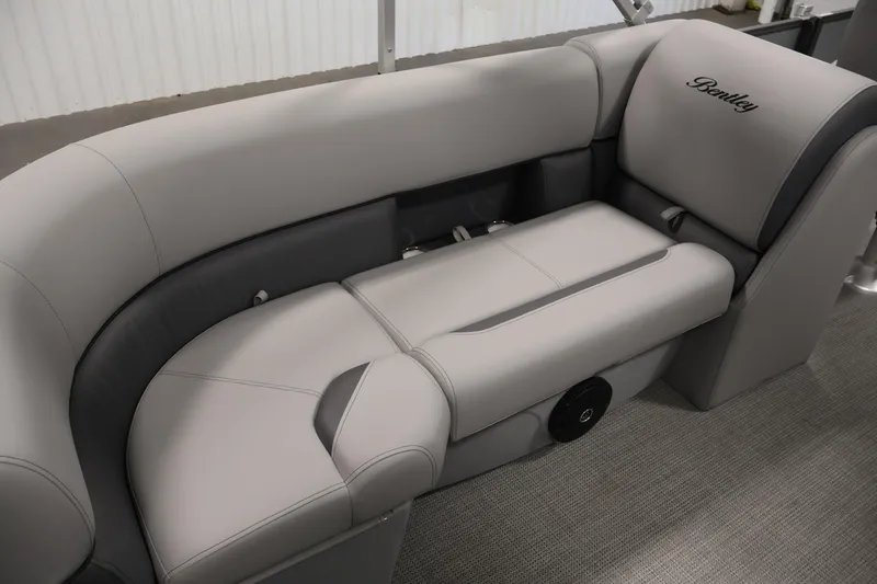 Slide: The Image of 2026 Bentley Pontoons 220 Navigator interior seating with elegant gray upholstery. - 25