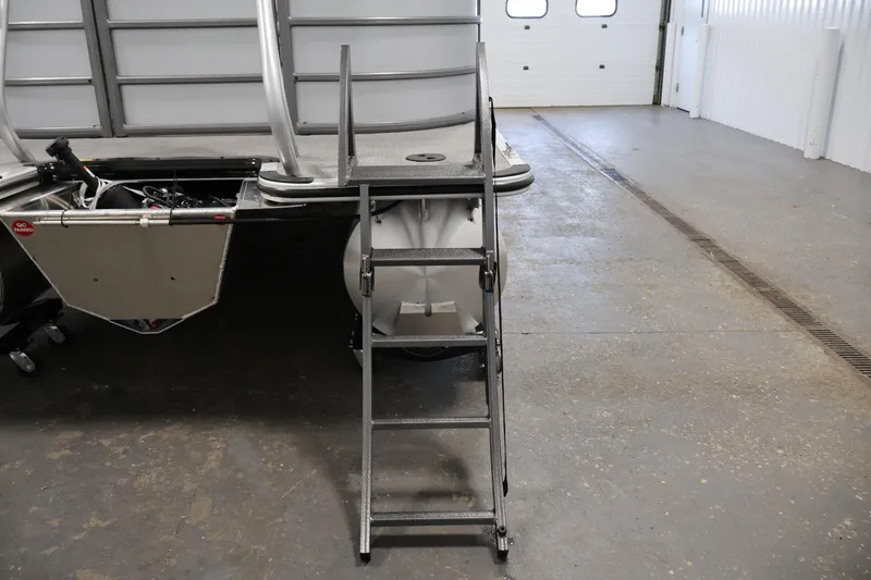 Slide: The Image of 2026 Bentley Pontoons 220 Navigator with ladder in a garage setting. - 33