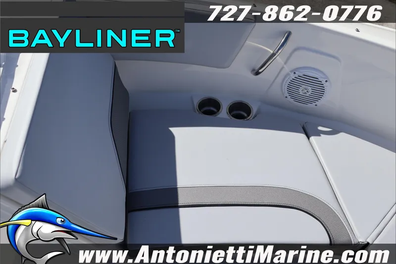Slide: The Image of Bayliner V20 2026 boat interior with seating, cup holders, and speaker. Contact Antonietti Marine. - 19