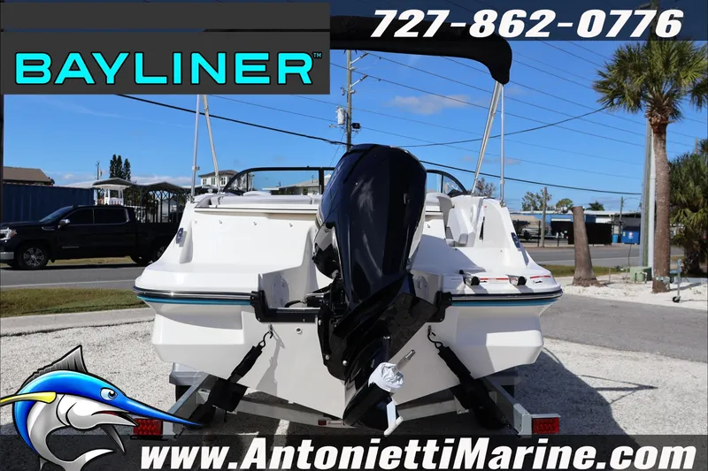 Slide: The Image of 2026 Bayliner V20 boat on trailer at Antonietti Marine dealership. - 4