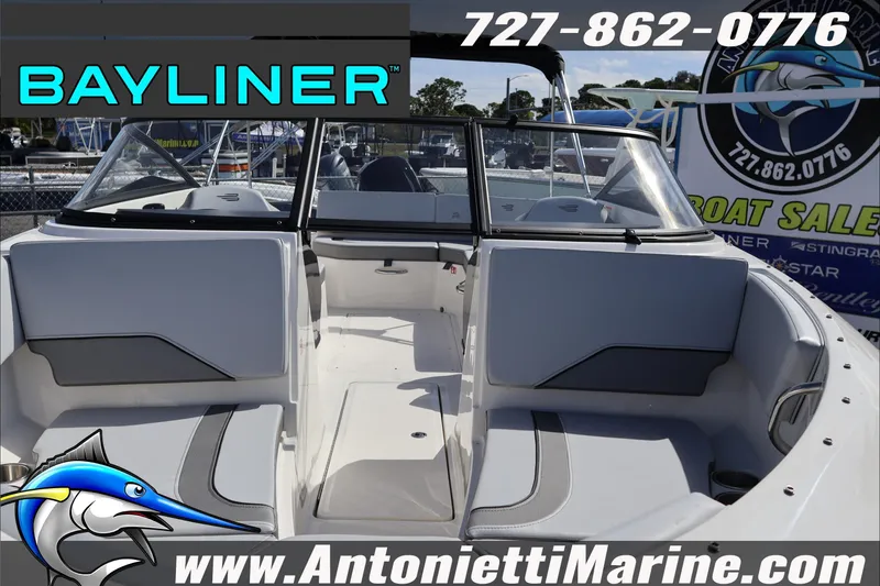 Slide: The Image of 2026 Bayliner V20 boat interior at Antonietti Marine, featuring seating and windshield. - 8