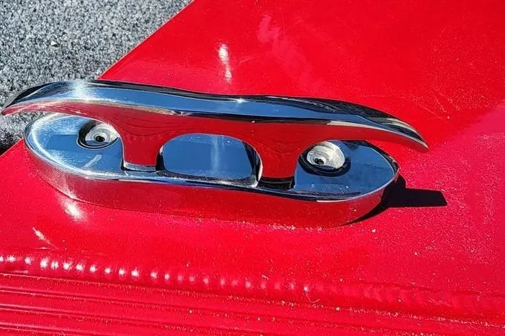 Slide: The Image of Chrome cleat on red 2026 Tracker Bass Tracker Classic XL boat deck. - 11