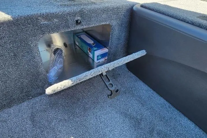 Slide: The Image of Storage compartment in 2026 Tracker Bass Tracker Classic XL boat interior. - 14