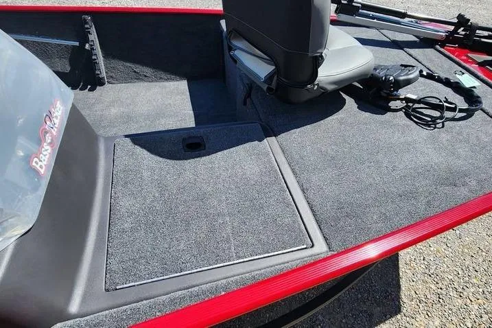 Slide: The Image of 2026 Tracker Bass Tracker Classic XL boat interior with seating and storage. - 5