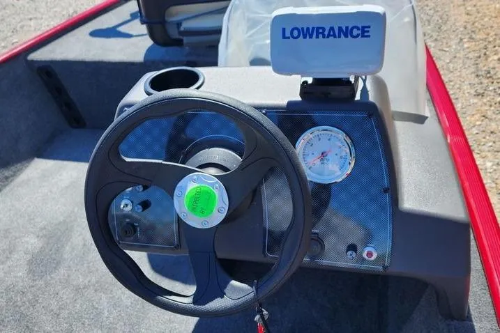 Slide: The Image of Steering console of 2026 Tracker Bass Tracker Classic XL with Lowrance display. - 6