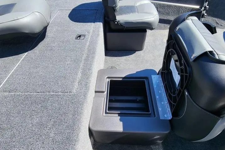 Slide: The Image of 2026 Tracker Bass Tracker Classic XL boat interior with seating and storage compartments. - 8