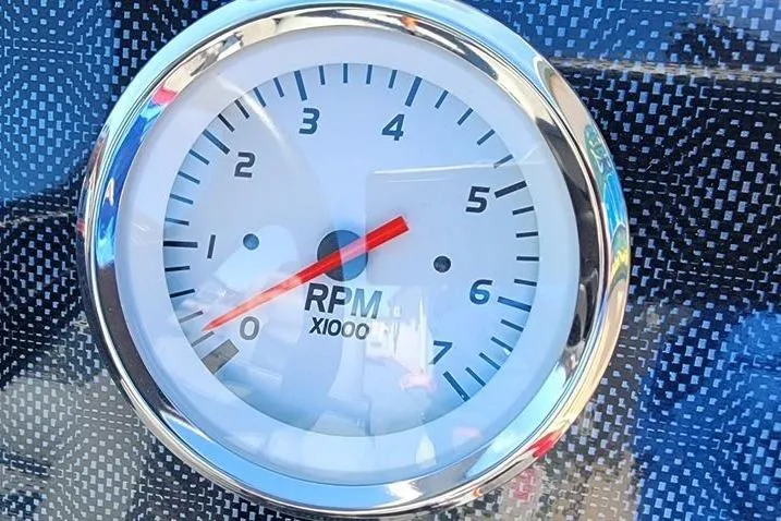 Slide: The Image of Tachometer of 2026 Tracker Bass Tracker Classic XL, displaying RPM on carbon fiber background. - 9