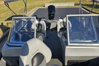 Slide: The Image of 2019 Tracker Pro Guide V-175 WT boat with dual windshields and seating. - 7
