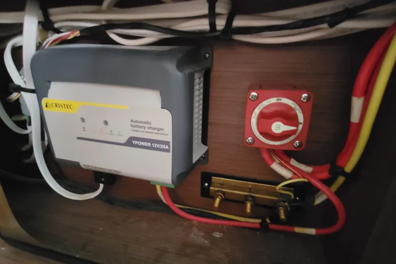 Slide: The Image of Battery charger and switch panel on 2023 Jeanneau NC 895 boat. - 25