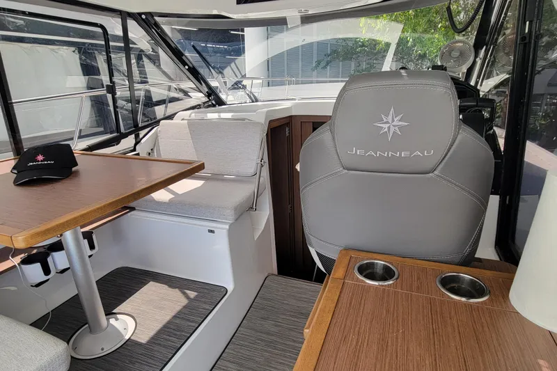 Slide: The Image of Interior of 2023 Jeanneau NC 895 boat with seating and table. - 9