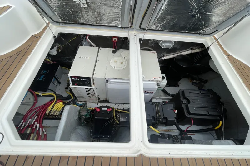 Slide: The Image of Engine compartment of a 2006 Meridian 459 Motoryacht with generator and wiring. - 11